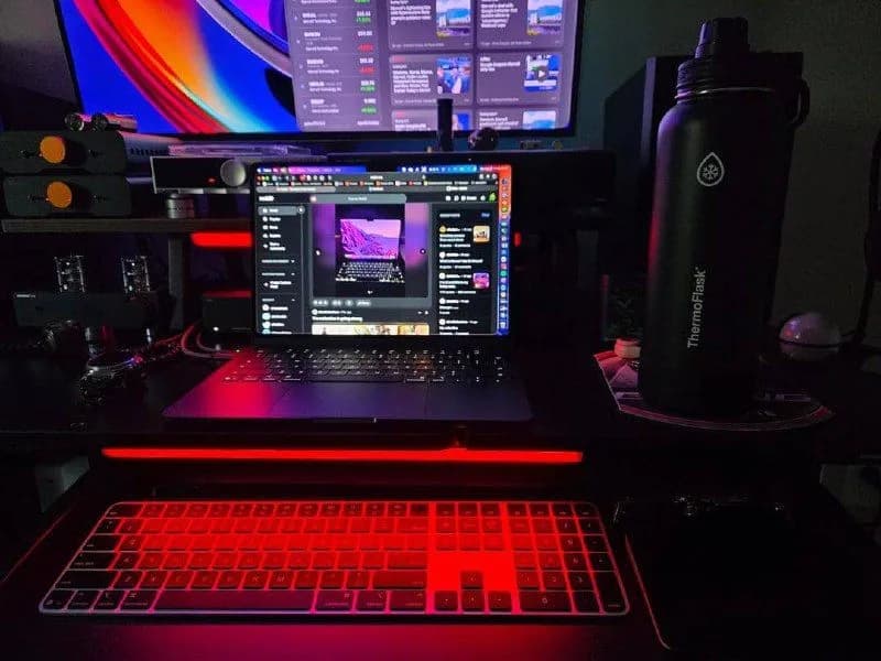 Red-Lit Laptop and Monitor Studio