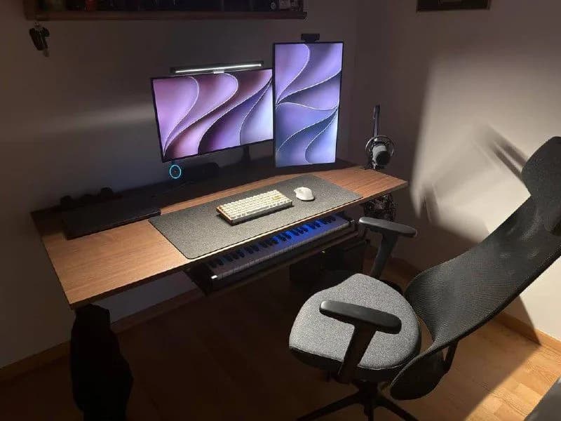 Compact Desk with Dual Monitors and Keyboard Piano